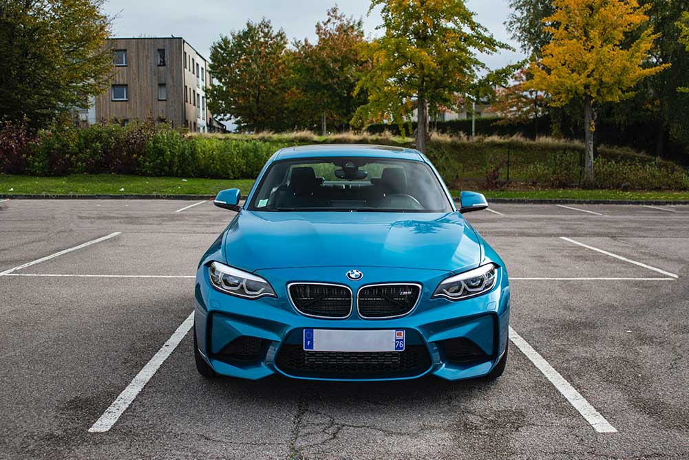 A BMW vehicle in a parking lot